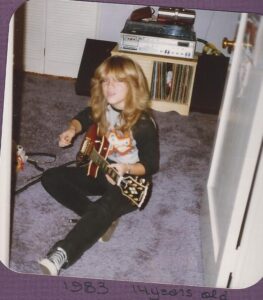 Me as a teenager, always playing my guitar.